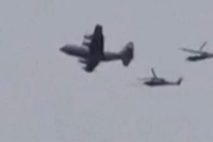 Imagen de un dron MQ-9 en vuelo, con la silueta de un F-35 al fondo