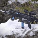 Imagen de una impresora 3D creando un fusil